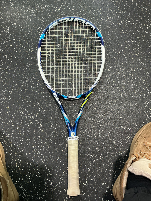 Vist Large View of Product Image Which is Used Wilson 100 UL  JUICE Adult Tennis Racquet White Unknown