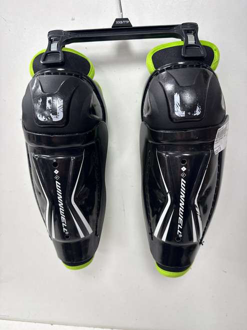 Vist Large View of Product Image Which is Used WinnWell AMP Youth Shin Guards Black 9"