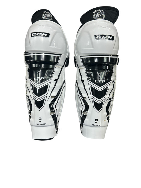 Vist Large View of Product Image Which is Used CCM LTP Junior Shin Guards White 12"
