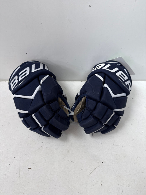 Vist Large View of Product Image Which is Used Bauer VAPOR X700 Junior Gloves Navy Blue 11"