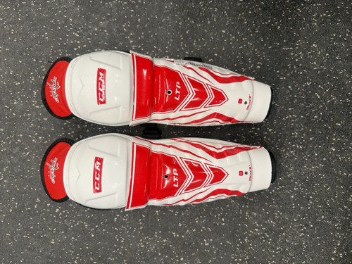 Vist Large View of Product Image Which is Used CCM LTP CAPITALS Youth Shin Guards White 9"