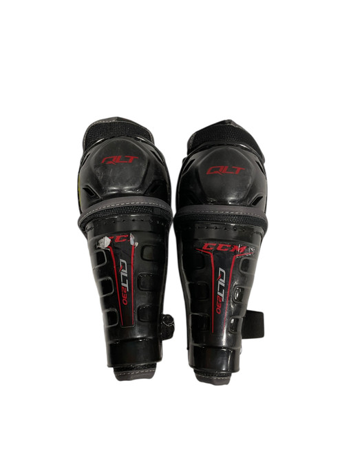 Vist Large View of Product Image Which is Used CCM QLT230 Youth Shin Guards Black 8"