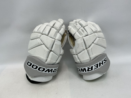 Vist Large View of Product Image Which is Used Sher-wood REKKER LEGEND PRO Junior Gloves White 12"