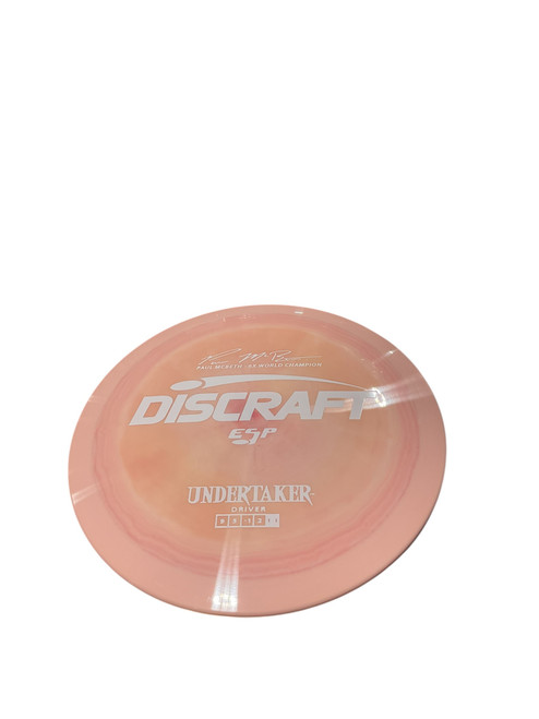 Vist Large View of Product Image Which is Used Discraft UNDERTAKER DRIVER Disc Golf Driver Coral