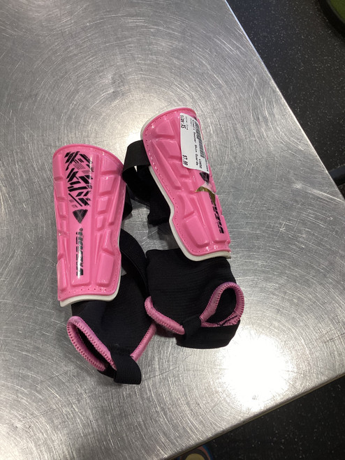 Vist Large View of Product Image Which is Used Brava Soccer Shin Guards Youth Pink XXS