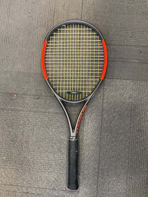 Vist Large View of Product Image Which is Used Wilson BURN 100 Adult Tennis Racquet Orange 4 1/2"