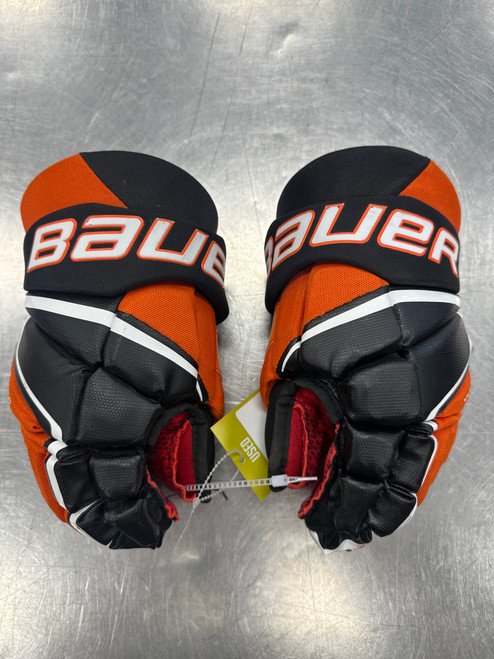 Vist Large View of Product Image Which is Used Bauer VAPOR 3X Junior Gloves Black And Orange 12"