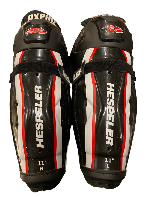 Vist Large View of Product Image Which is Used Hespeler RXPRO Youth Shin Guards Black 11"