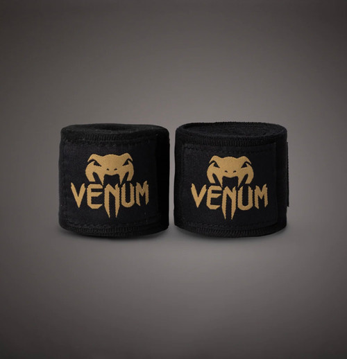 Vist Large View of Product Image Which is New Venum Kontact Boxing Hand Wraps Black/Gold 4.5m (180 in)