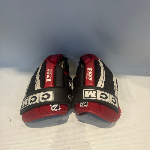 Vist Large View of Product Image Which is Used CCM CCM TACKS 492 Junior Gloves Black And Wine Red 12"