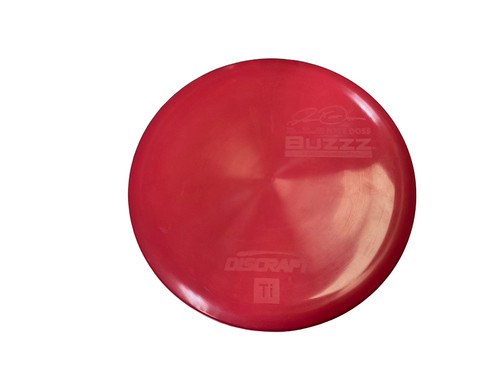 Vist Large View of Product Image Which is New Discraft TI BUZZZ NATE DOSS 2011 WORLD CHAMP Disc Golf Mid Range Red 175g