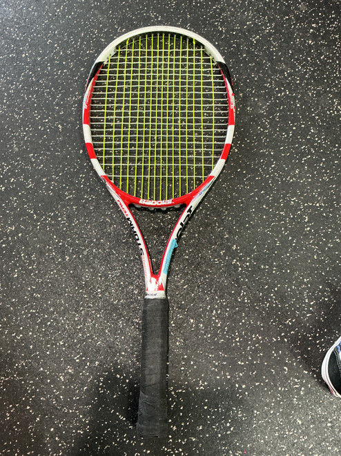 Vist Large View of Product Image Which is Used Babolat PURE STORM TEAM Adult Tennis Racquet Red 4 3/8"