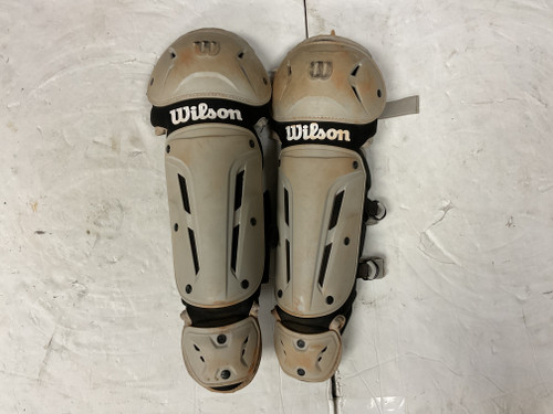 Vist Large View of Product Image Which is Used Wilson YTH Catchers Leg Guards White And Black Youth