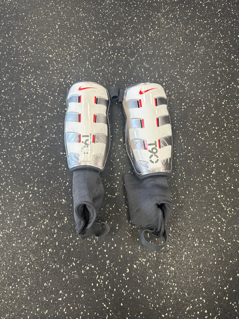 Vist Large View of Product Image Which is Used Nike T90 Soccer Shin Guards Junior White Junior