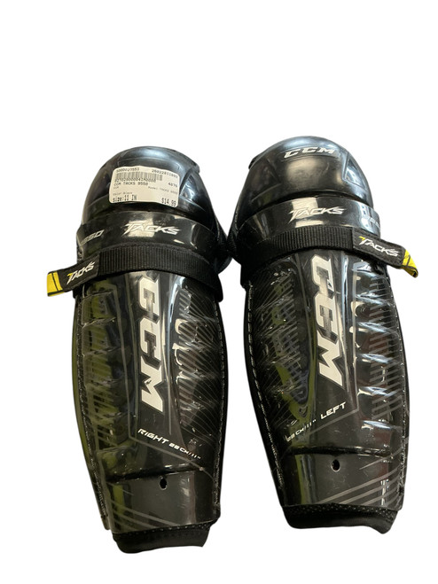 Vist Large View of Product Image Which is Used CCM TACKS 9550 Junior Shin Guards Black 11"