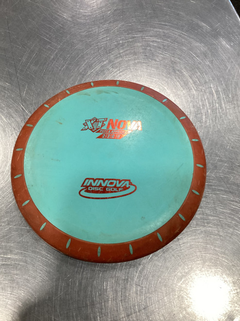 Vist Large View of Product Image Which is Used Innova XT NOVA Disc Golf Putter Carolina Blue