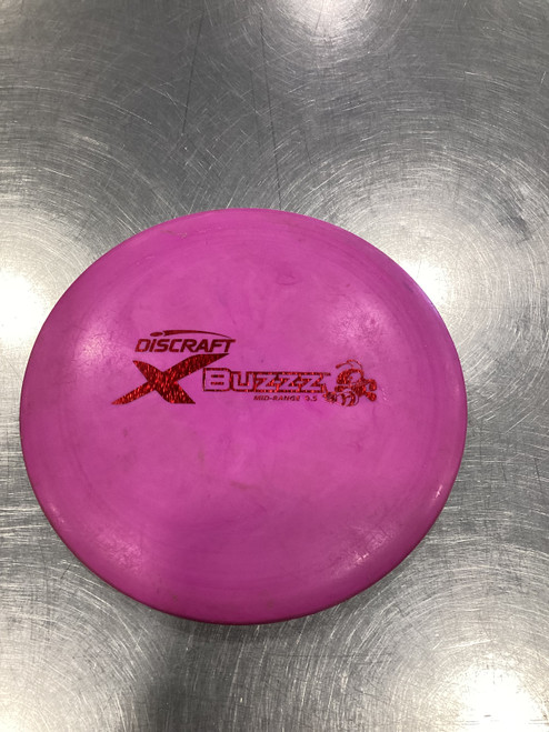 Vist Large View of Product Image Which is Used Discraft X BUZZZ Disc Golf Mid Range Pink