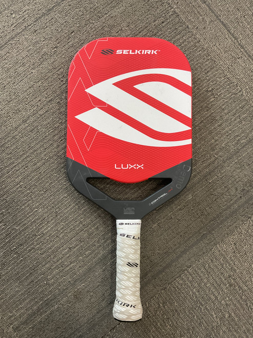 Vist Large View of Product Image Which is Used Selkirk LUXX INVIKTA CONTROL AIR PADDLE Pickleball Racquet Red