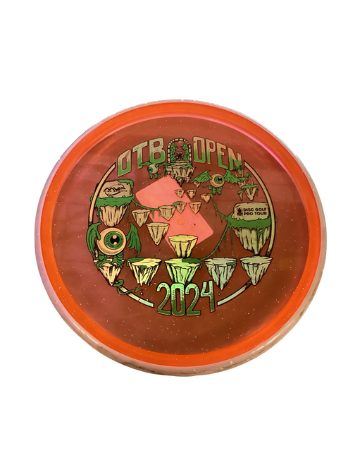 Vist Large View of Product Image Which is Used MVP PYRO Disc Golf Mid Range Orange