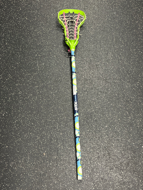 Vist Large View of Product Image Which is Used Under Armour T22 Wmn Atk/Mid Complete Stick Green