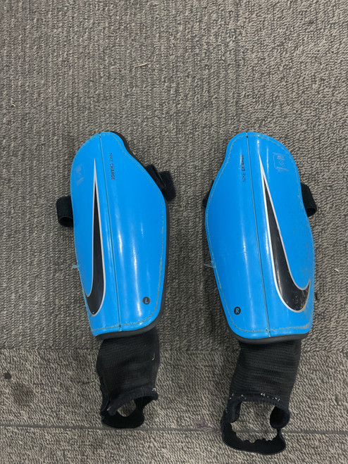 Vist Large View of Product Image Which is Used Nike CHARGE Soccer Shin Guards Junior Royal Blue MD