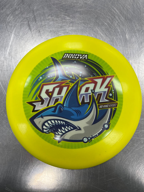 Vist Large View of Product Image Which is Used Innova DX SHARK Disc Golf Mid Range Yellow