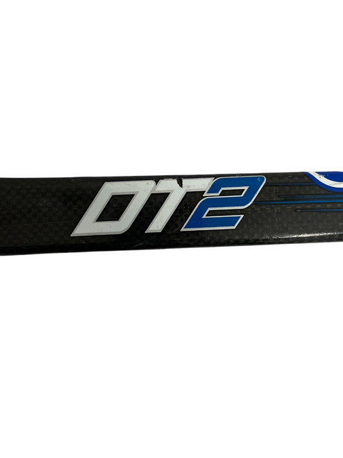 Vist Large View of Product Image Which is Used Warrior Covert DT2 55 Flex Intermediate One Piece Right Handed Hockey Stick