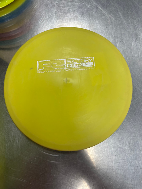 Vist Large View of Product Image Which is Used Innova KC ROC Disc Golf Mid Range Yellow