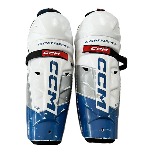 Vist Large View of Product Image Which is Used CCM NEXT SHIN Intermediate Shin Guards White 12"
