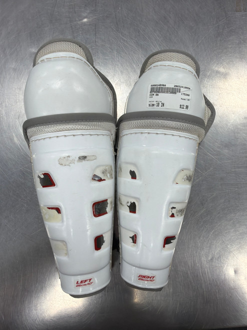Vist Large View of Product Image Which is Used CCM 06 Junior Shin Guards White 10"