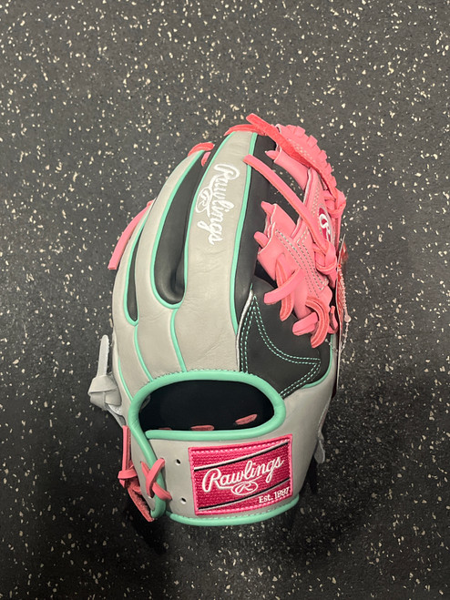 Vist Large View of Product Image Which is Used Rawlings HEART OF THE HIDE PROR934-2DSP NWT BB/SB Glove RH Throw Black And Pink 11 1/2"