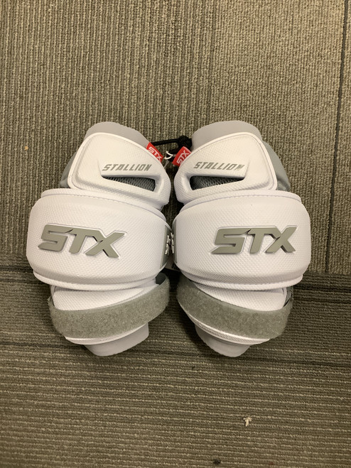 Vist Large View of Product Image Which is Used STX 1K Lacrosse Arm Pads/Guards White SM