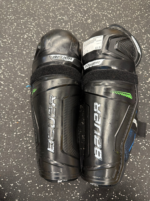 Vist Large View of Product Image Which is Used Bauer X Junior Shin Guards Black 11"