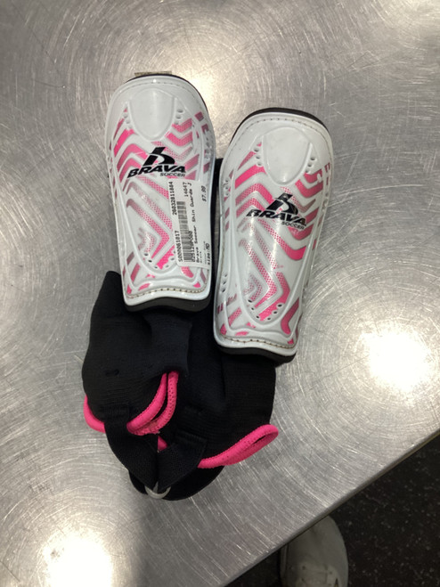 Vist Large View of Product Image Which is Used Brava Soccer Shin Guards Junior Pink MD