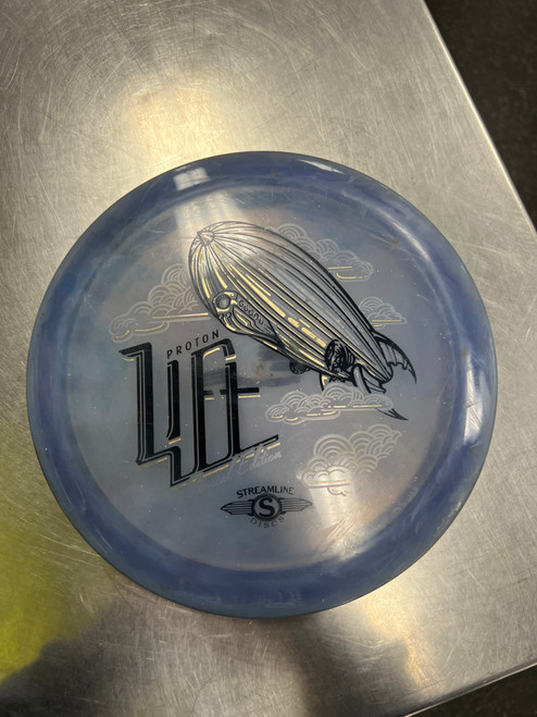 Vist Large View of Product Image Which is Used Streamline PROTON LIFT Disc Golf Driver Royal Blue