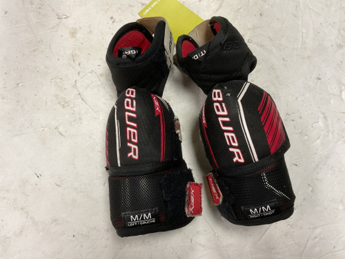 Vist Large View of Product Image Which is Used Bauer NSX Junior Elbow Pads Black And Red MD