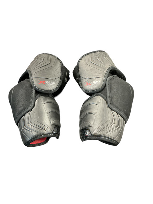 Vist Large View of Product Image Which is Used Bauer VAPOR X900 LITE ELBOW PADS Senior Elbow Pads MD