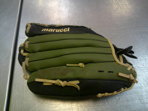 Vist Large View of Product Image Which is Used Marucci SWIFT SERIES BB/SB Glove RH Throw Black 12"