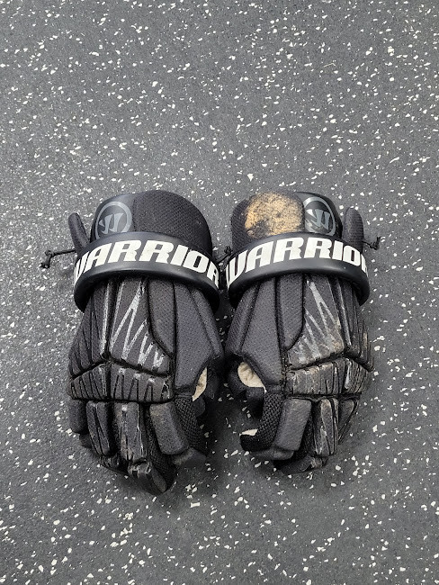 Vist Large View of Product Image Which is Used Warrior BURN NEXT Lacrosse Gloves Junior Black SM