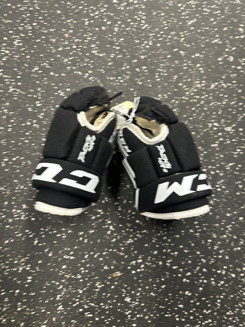 Vist Large View of Product Image Which is Used CCM TACKS 4R2 Youth Gloves Black 8"
