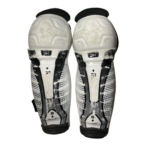 Vist Large View of Product Image Which is Used Reebok KFS 3K Youth Shin Guards White 9"