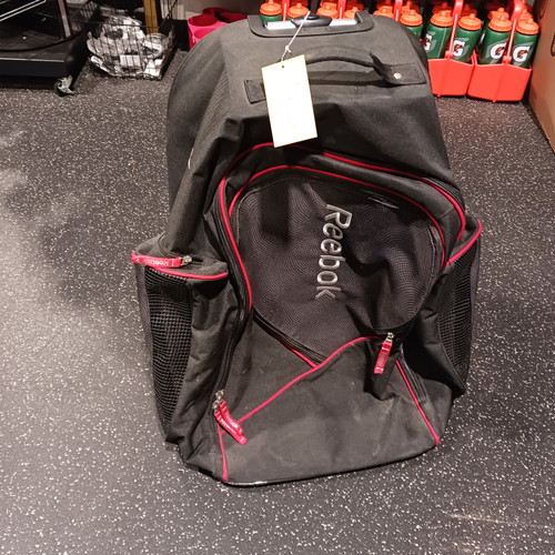 Vist Large View of Product Image Which is Used Reebok Sr Hockey Wheeled Red