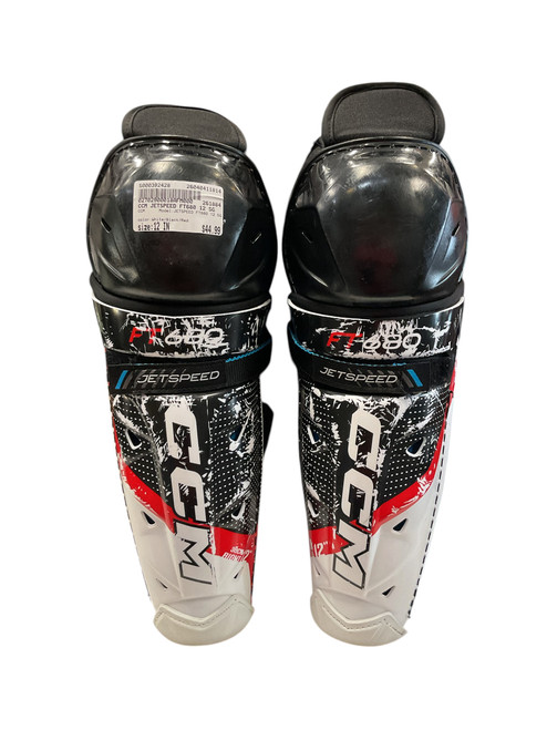 Vist Large View of Product Image Which is Used CCM JETSPEED FT680 12 SG Junior Shin Guards White/Black/Red 12"
