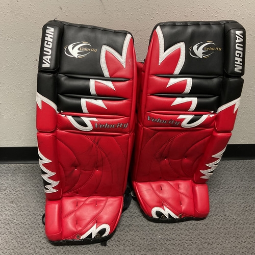 Vist Large View of Product Image Which is Used Vaughn VELOCITY 7000 Goalie Leg Pads Senior Red And Black 33"