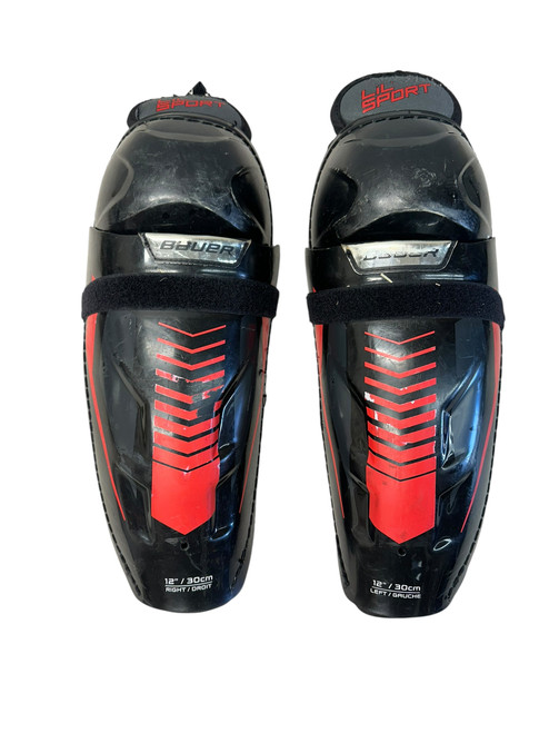 Vist Large View of Product Image Which is Used Bauer LIL SPORT Junior Shin Guards Black 12"