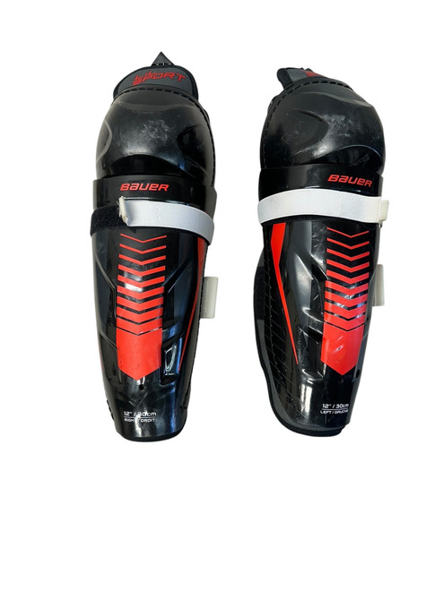 Vist Large View of Product Image Which is Used Bauer LIL SPORT Junior Shin Guards Black And Red 12"