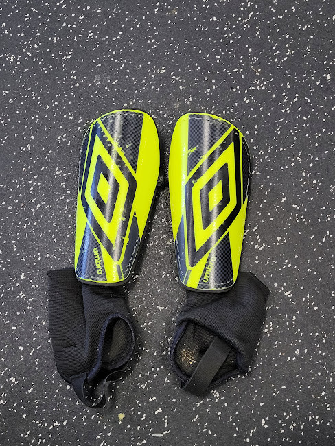 Vist Large View of Product Image Which is Used Umbro Soccer Shin Guards Adult Yellow MD