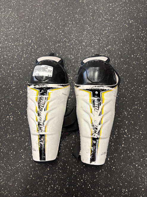 Vist Large View of Product Image Which is Used Bauer BAUER SUPREME SHINS Youth Shin Guards White 9"
