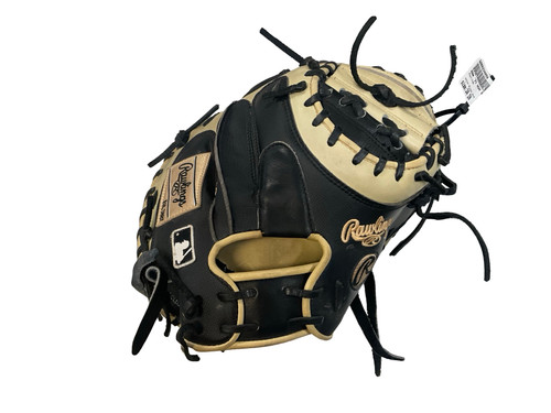 Vist Large View of Product Image Which is Used Rawlings PROYM4BC BB/SB Catchers RH Throw Black And Tan 34"
