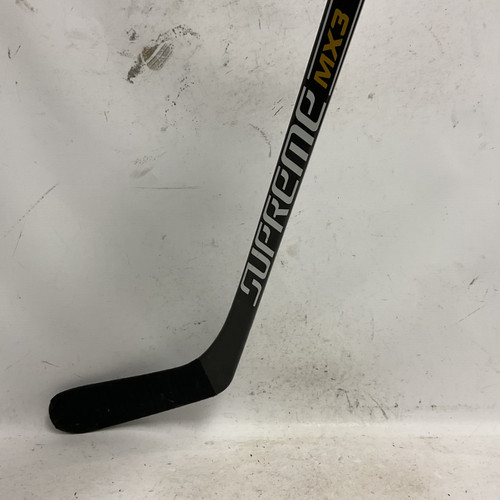 Vist Large View of Product Image Which is Used Bauer SUPREME TOTAL ONE MX3 Senior One Pce Right Grip Black And Gold 87 Flex